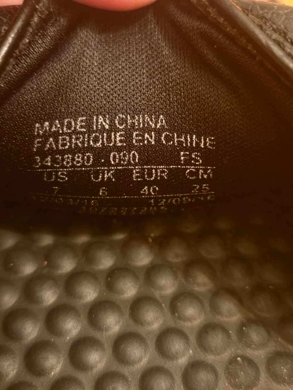 Nike Black Slides with White Swoosh Logo